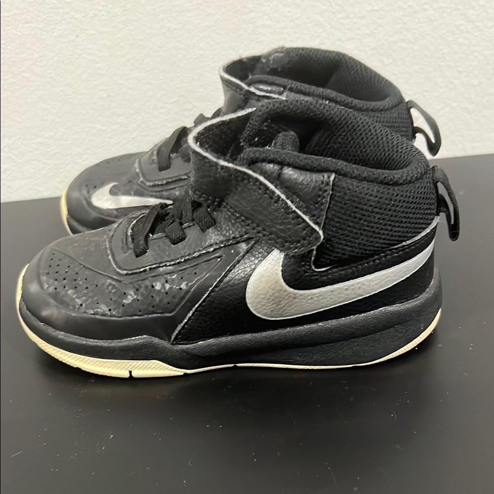 Nike Black and Silver Sneakers with Classic Design